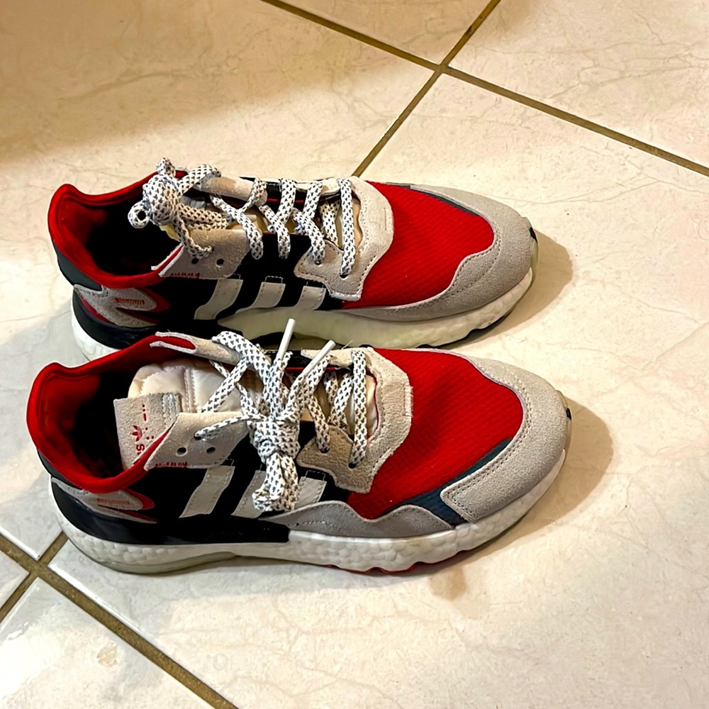 Red,white & blue adidas sneakers.